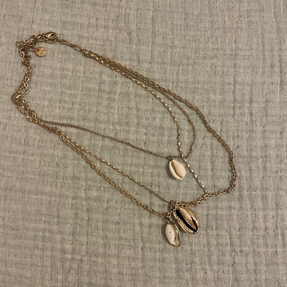 Layered gold seashell necklace